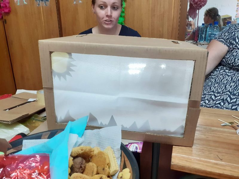 Kim building her light-box